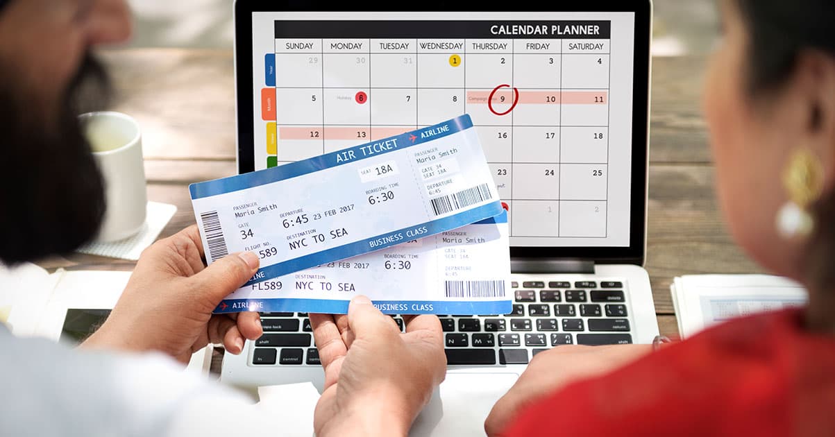 Airplane on tarmac with boarding pass and passport