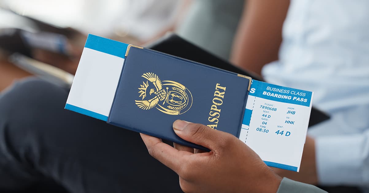 Close-up of flight reservation document with PNR code highlighted